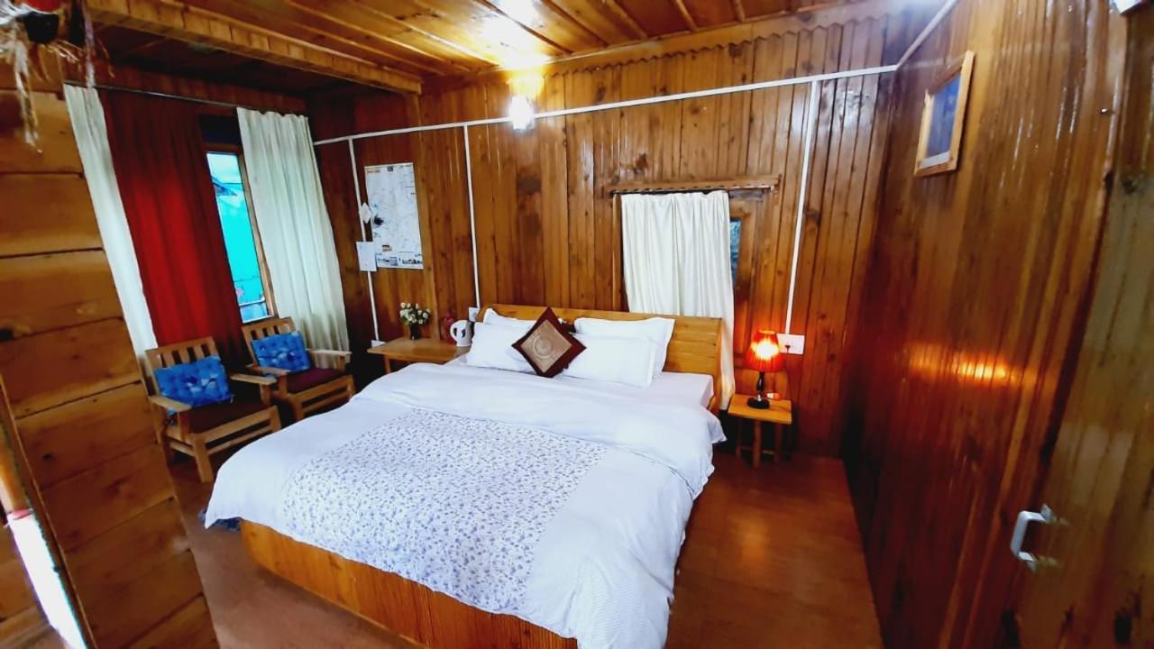 Ishan Log Huts-A Boutique Home Stay Banjar Екстер'єр фото