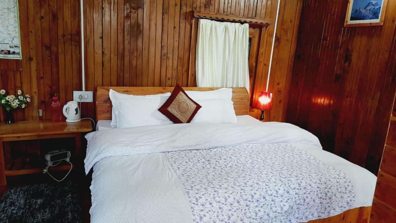 Ishan Log Huts-A Boutique Home Stay Banjar Екстер'єр фото