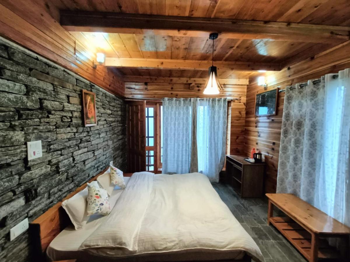 Ishan Log Huts-A Boutique Home Stay Banjar Екстер'єр фото