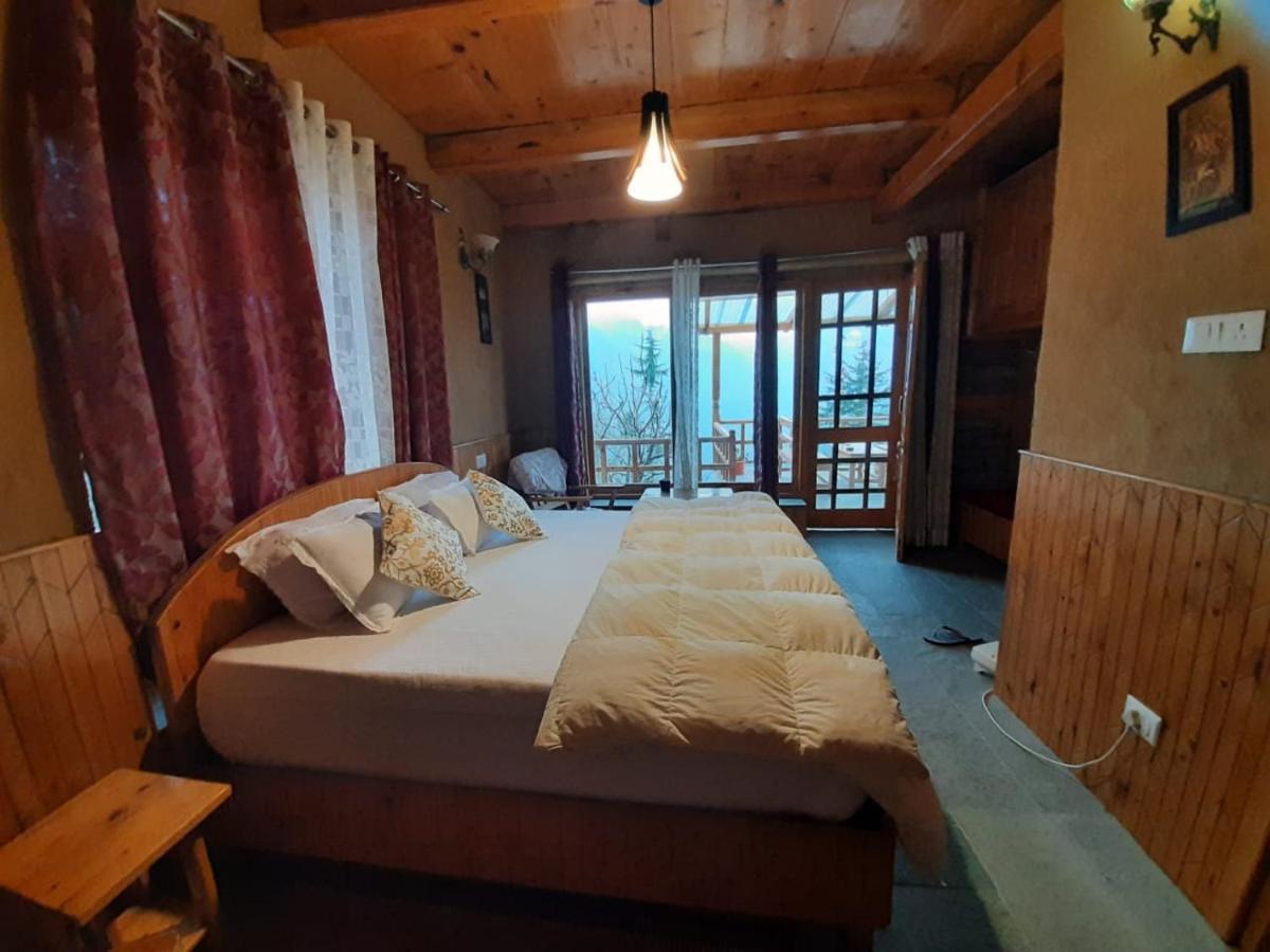 Ishan Log Huts-A Boutique Home Stay Banjar Екстер'єр фото